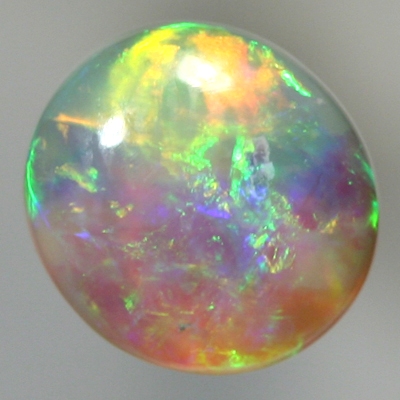 SOLID CRYSTAL OPAL Rolling flashes of orange and green fire 